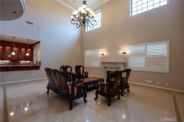 Chandelier, Dining room, Fireplace, Interior, Pendant Lights