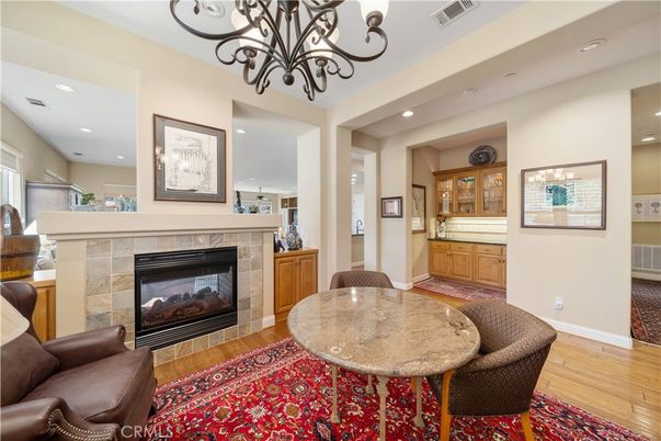 Chandelier, Dining room, Fireplace, Interior, Recessed Lighting, Wood Texture Flooring