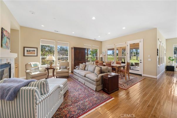 Dining room, Fireplace, Interior, Living room, Recessed Lighting, Wood Texture Flooring