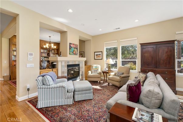 Chandelier, Dining room, Fireplace, Interior, Living room, Recessed Lighting, Wood Texture Flooring