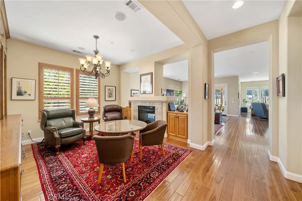 Chandelier, Fireplace, Interior, Recessed Lighting, Wood Texture Flooring