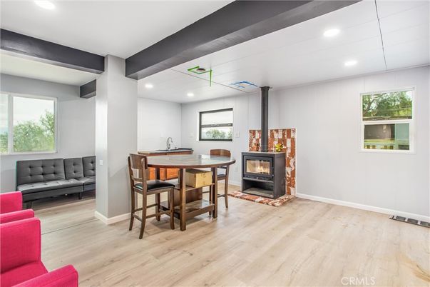 Dining room, Fireplace, Interior, Recessed Lighting, Wood Texture Flooring