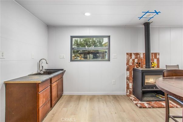 Fireplace, Interior, Recessed Lighting, Wood Texture Flooring