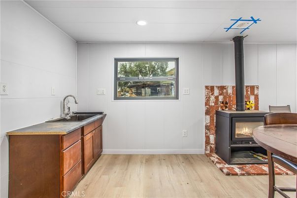 Fireplace, Interior, Recessed Lighting, Wood Texture Flooring