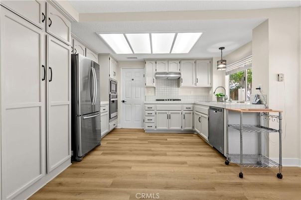 Interior, Kitchen, Pendant Lights, Stainless Steel Appliances, Wood Texture Flooring