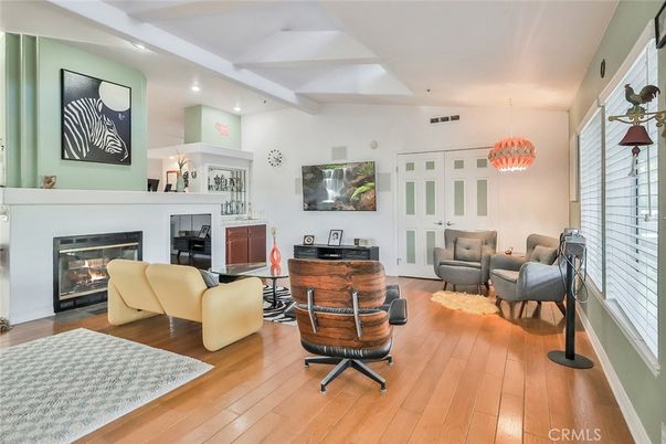 Fireplace, Interior, Living room, Pendant Lights, Piano, Recessed Lighting, Wood Texture Flooring