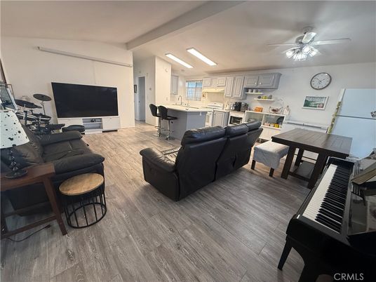 Dining room, Interior, Kitchen, Living room, Piano, Recessed Lighting, Wood Texture Flooring