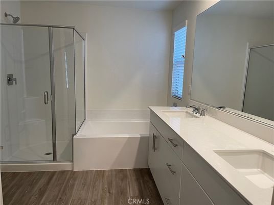 Bathroom, Dual Sink Vanities, Glass Shower, Interior, Wood Texture Flooring