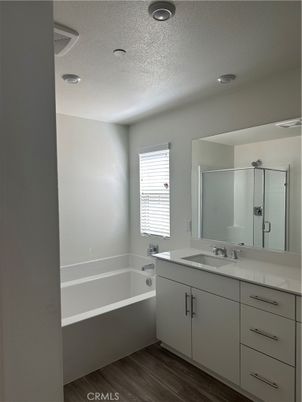 Bathroom, Dual Sink Vanities, Interior, Recessed Lighting, Wood Texture Flooring