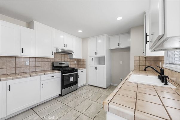 Interior, Kitchen, Recessed Lighting, Tile Countertops