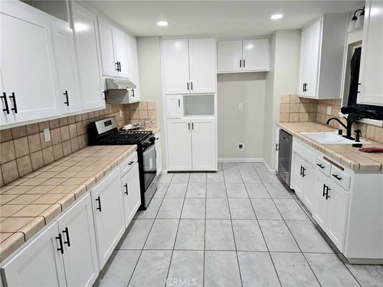 Interior, Kitchen, Recessed Lighting, Tile Countertops
