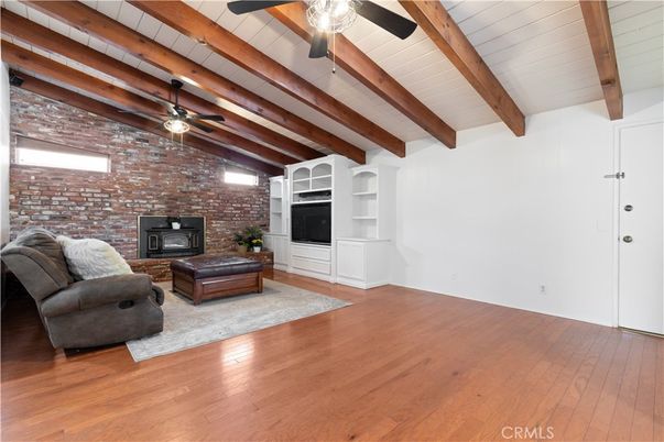 Fireplace, Interior, Living room, Stone Walls, Wooden Beams, Wood Texture Flooring