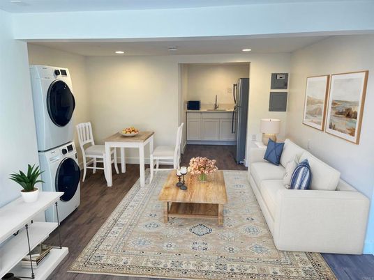 Dining room, Interior, Living room, Recessed Lighting, Utility Closets, Washer, Wood Texture Flooring