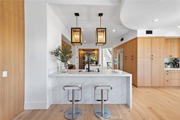 Interior, Kitchen, Marble Walls, Pendant Lights, Recessed Lighting, Wood Texture Flooring