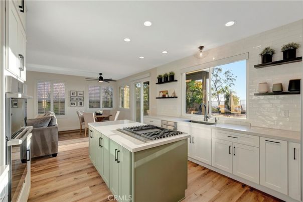 Dining room, Interior, Kitchen, Recessed Lighting, Stainless Steel Appliances, Wood Texture Flooring