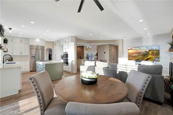 Dining room, Interior, Kitchen, Living room, Recessed Lighting, Stainless Steel Appliances, Wood Texture Flooring