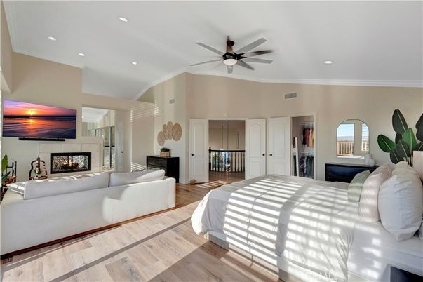 Bedroom, Fireplace, Interior, Recessed Lighting, Wood Texture Flooring