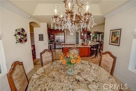 Chandelier, Dining room, Interior, Kitchen, Stainless Steel Appliances, Wood Texture Flooring