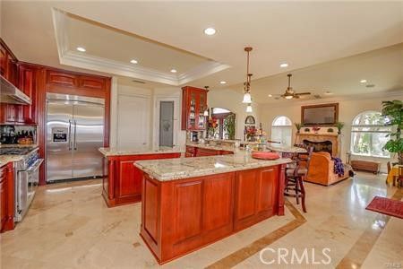Fireplace, Interior, Kitchen, Living room, Pendant Lights, Recessed Lighting, Stainless Steel Appliances
