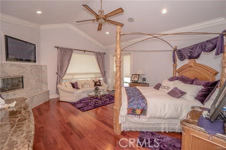 Bedroom, Fireplace, Interior, Recessed Lighting, Wood Texture Flooring