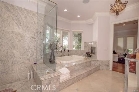 Bathroom, Chandelier, Glass Shower, Interior, Recessed Lighting, Wood Texture Flooring
