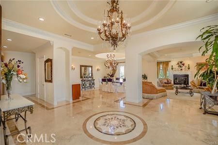 Chandelier, Dining room, Fireplace, Interior, Living room, Marble, Recessed Lighting