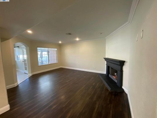 Empty room, Fireplace, Interior, Recessed Lighting, Wood Texture Flooring