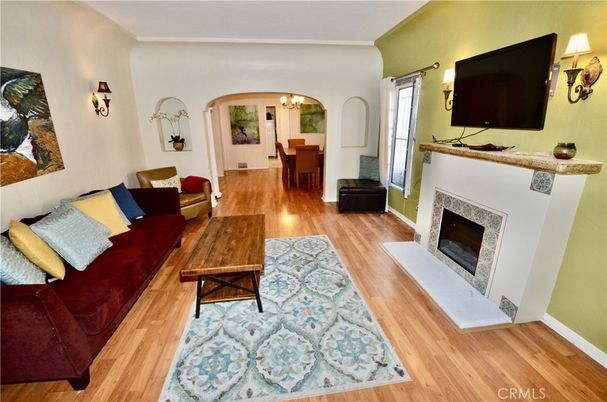 Chandelier, Dining room, Fireplace, Interior, Living room, Wood Texture Flooring