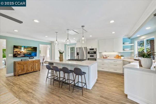 Interior, Kitchen, Pendant Lights, Recessed Lighting, Stainless Steel Appliances, Wood Texture Flooring