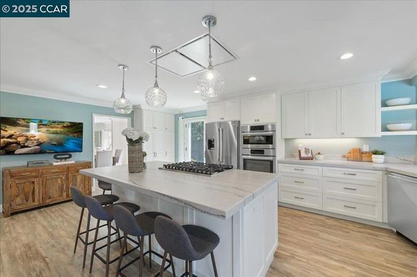 Interior, Kitchen, Pendant Lights, Recessed Lighting, Stainless Steel Appliances, Wood Texture Flooring