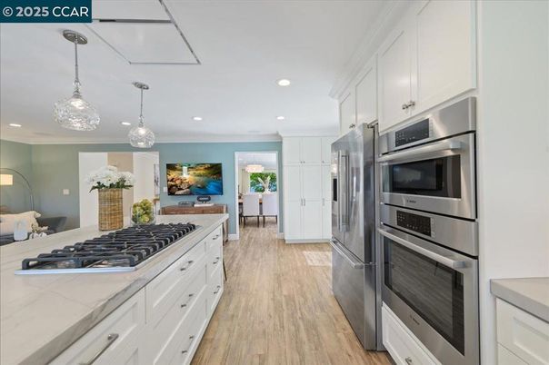 Interior, Kitchen, Pendant Lights, Recessed Lighting, Stainless Steel Appliances, Wood Texture Flooring