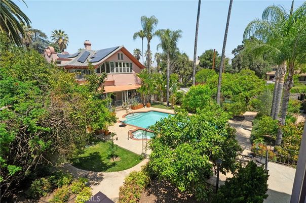 Exterior, Pool, Solar Panels