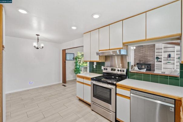Chandelier, Interior, Kitchen, Recessed Lighting, Stainless Steel Appliances, Wood Texture Flooring