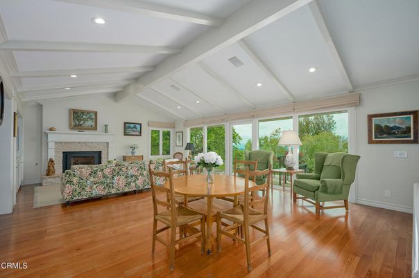 Dining room, Fireplace, Interior, Living room, Recessed Lighting, Wood Texture Flooring