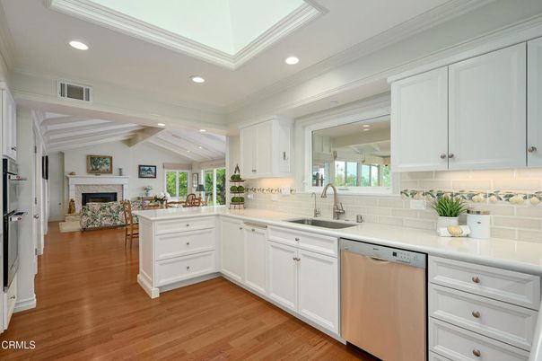 Fireplace, Interior, Kitchen, Recessed Lighting, Stainless Steel Appliances, Wood Texture Flooring