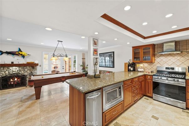 Billiard Table, Fireplace, Interior, Kitchen, Pendant Lights, Recessed Lighting, Stainless Steel Appliances