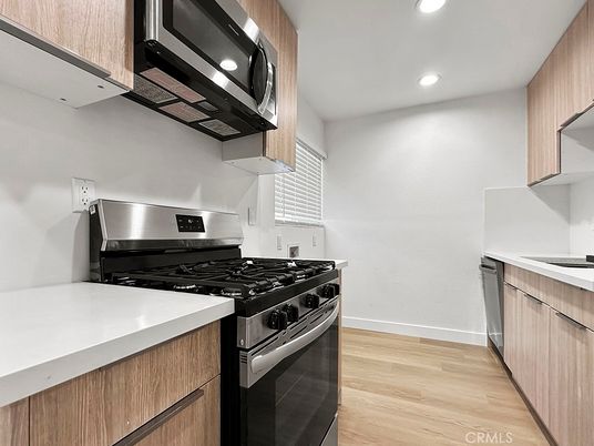 Interior, Kitchen, Recessed Lighting, Stainless Steel Appliances, Wood Texture Flooring