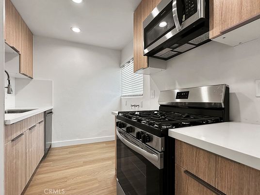 Interior, Kitchen, Recessed Lighting, Stainless Steel Appliances, Wood Texture Flooring