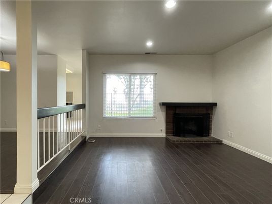 Empty room, Fireplace, Interior, Pendant Lights, Recessed Lighting, Wood Texture Flooring
