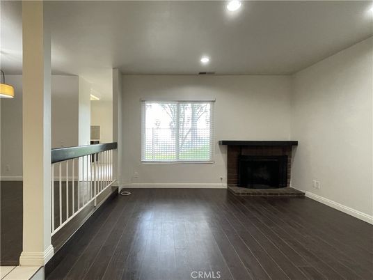 Fireplace, Interior, Pendant Lights, Recessed Lighting, Wood Texture Flooring