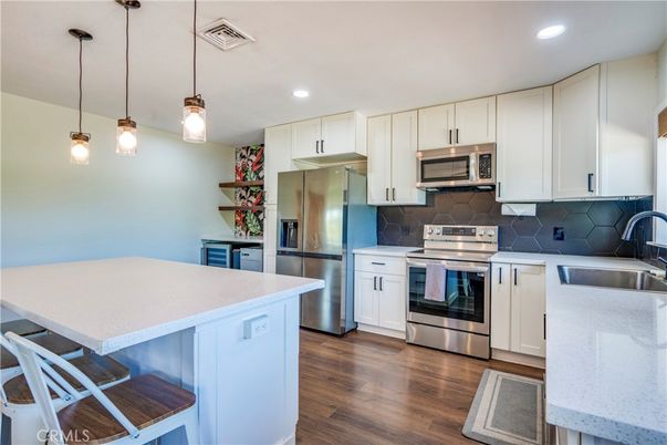 Interior, Kitchen, Pendant Lights, Recessed Lighting, Stainless Steel Appliances, Wood Texture Flooring