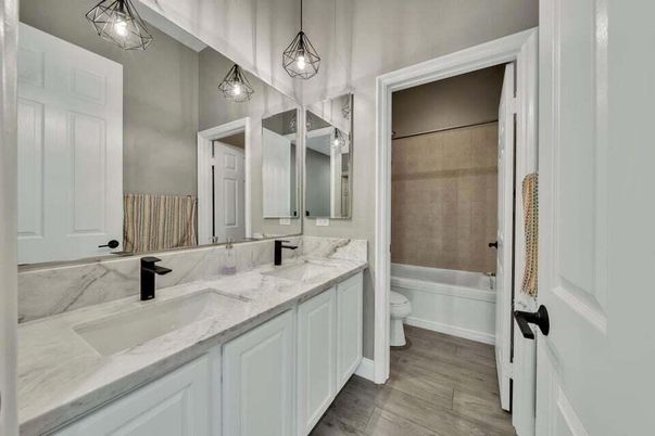 Bathroom, Dual Sink Vanities, Interior, Pendant Lights, Wood Texture Flooring