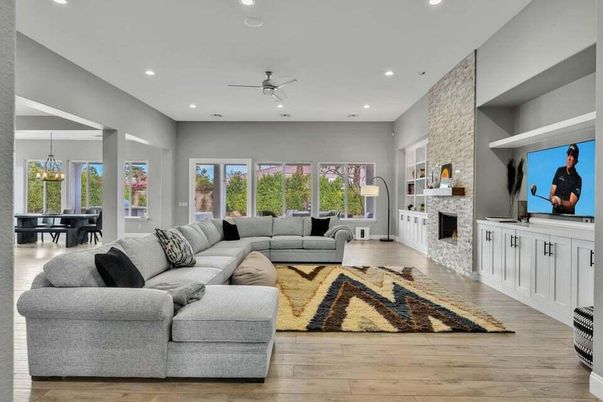 Chandelier, Dining room, Fireplace, Interior, Living room, Recessed Lighting, Stone Walls, Wood Texture Flooring