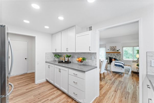 Fireplace, Interior, Kitchen, Recessed Lighting, Wood Texture Flooring