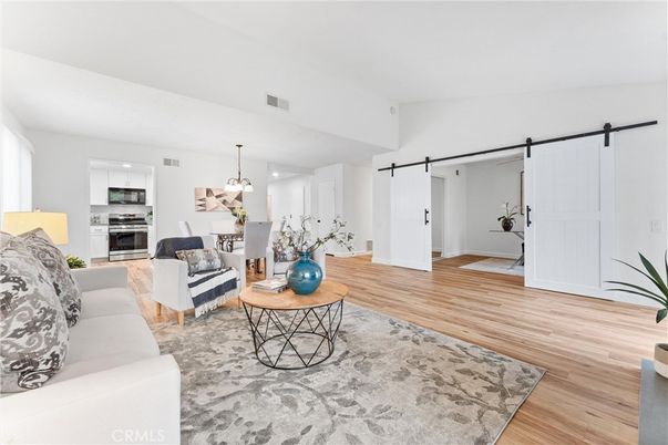 Dining room, Interior, Kitchen, Living room, Pendant Lights, Recessed Lighting, Stainless Steel Appliances, Wood Texture Flooring
