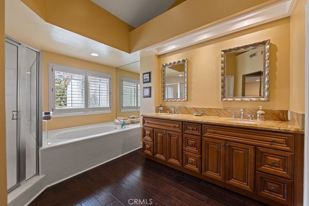 Bathroom, Dual Sink Vanities, Interior, Recessed Lighting, Wood Texture Flooring