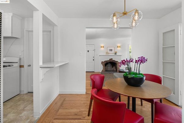 Dining room, Fireplace, Interior, Pendant Lights, Wood Texture Flooring