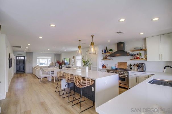 Dining room, Interior, Kitchen, Living room, Pendant Lights, Recessed Lighting, Stainless Steel Appliances, Wood Texture Flooring