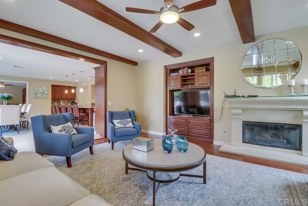 Dining room, Fireplace, Interior, Living room, Pendant Lights, Recessed Lighting, Wooden Beams, Wood Texture Flooring