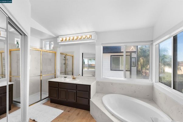 Bathroom, Dual Sink Vanities, Glass Shower, Interior, Wood Texture Flooring